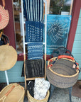 Vintage African mud cloth textiles displayed at Salty at Heart
