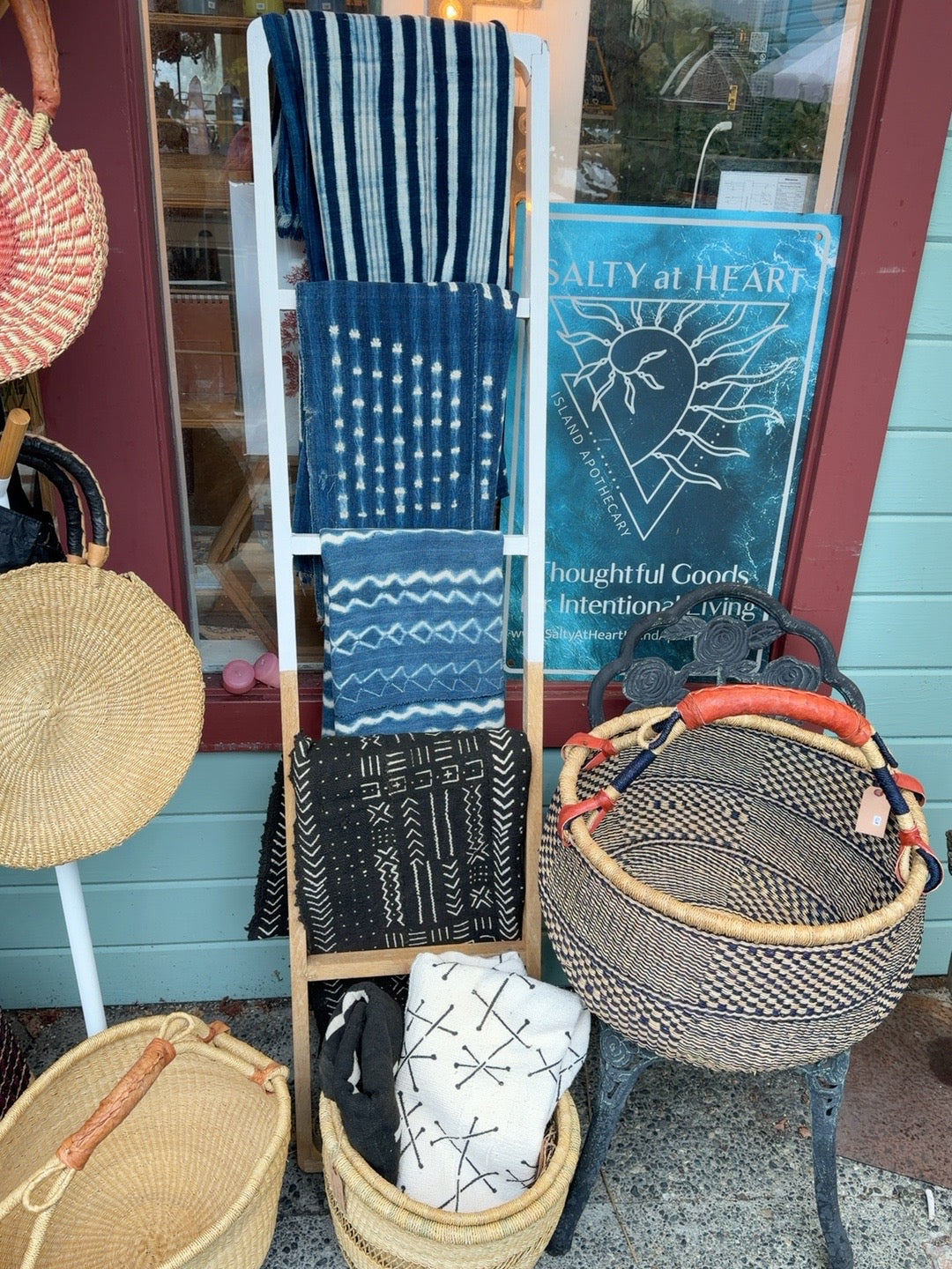 Vintage African mud cloth textiles displayed at Salty at Heart